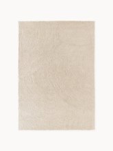 Tapis beige à poils courts